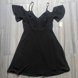 The Impeccable Pig Black Mini Dress